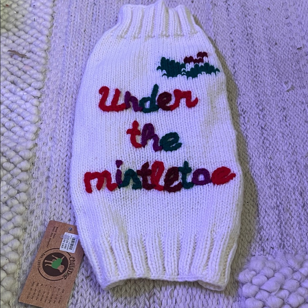 Knit Under the Mistletoe Dog Christmas Sweater from Anthropologie.